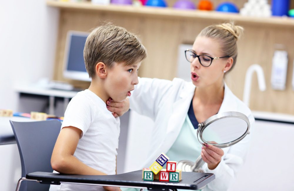 cute-little-boy-speech-therapist-office